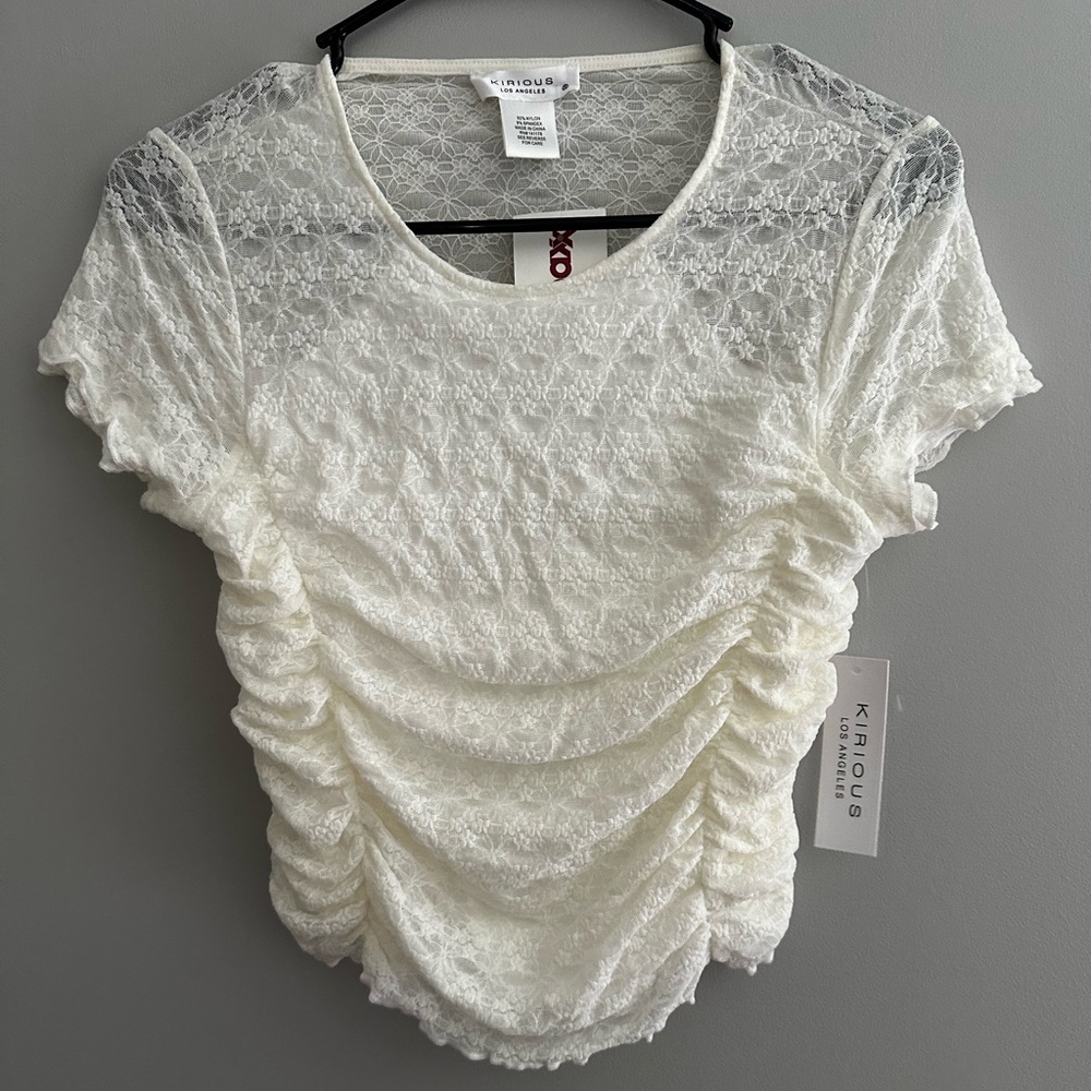 white lace Kirious top with cinched sides !